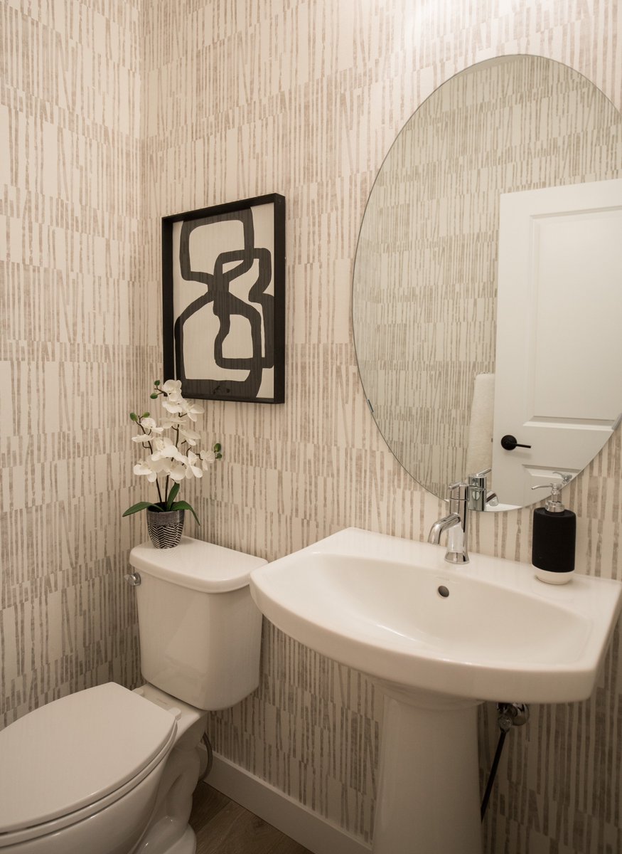 RCID_'s tweet photo. We can’t resist adding a great patterned wallpaper to a powder room! It gives a small room just the right amount of personality and style. #rcid #throwback #TheCascade @BrookfieldYYC https://t.co/cpGktRH9cT https://t.co/5QLuC0OUDo