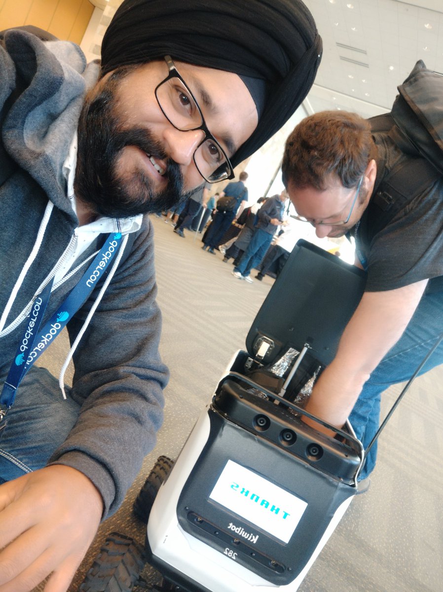 ajeetsraina's tweet image. A Selfie with super cute #Kiwibot #Dockercon2019