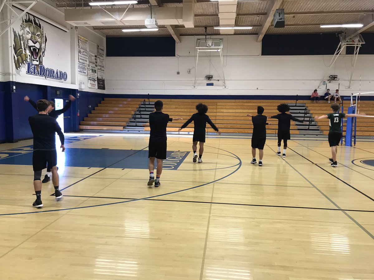 LGA boys volleyball warming up for round 2 of playoffs.  #golions