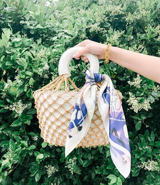 TiffanyOlson's tweet photo. This scarf collab between @darlingdownsouth &amp; @hannahbetzelfineart 😍 - the perfect Mother’s Day gift!  You can see more ways to style it at @shopdarlingdownsouth. I’ve had it tied on my bag for a while but you can also wear it in your hair (@city.pea… https://t.co/QVaFk8yZCA https://t.co/Sc8pjCJTXj