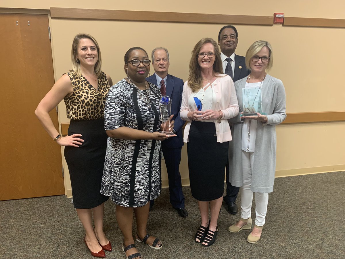 The weV team proudly accepts our center of excellence awards for South Florida, State of Florida, and Region IV (Southeastern USA)