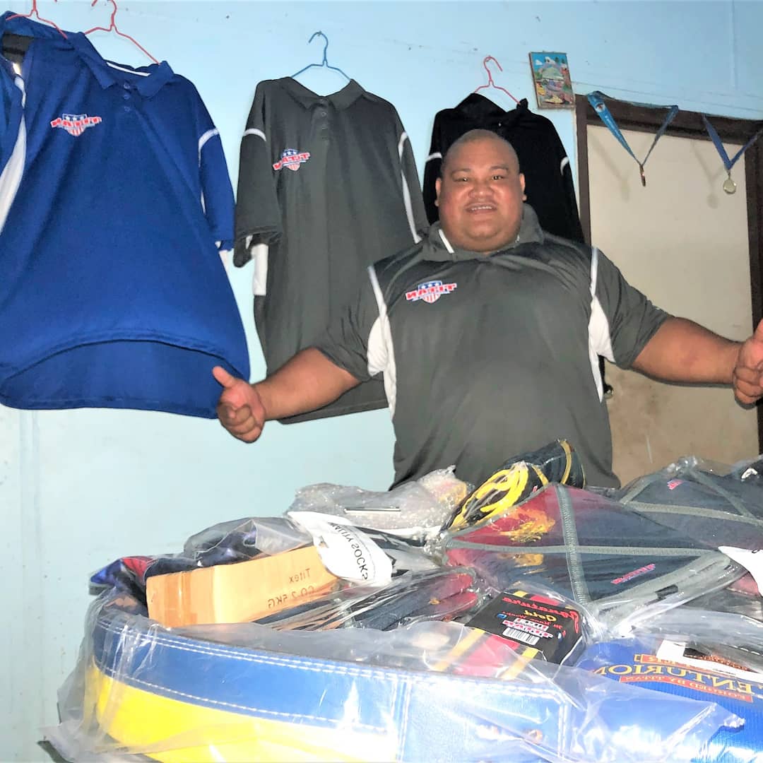 Team Titan member Jezza Uepa receives his new kit for IPF World Classic Powerlifting Championships in Helsingborg Sweden