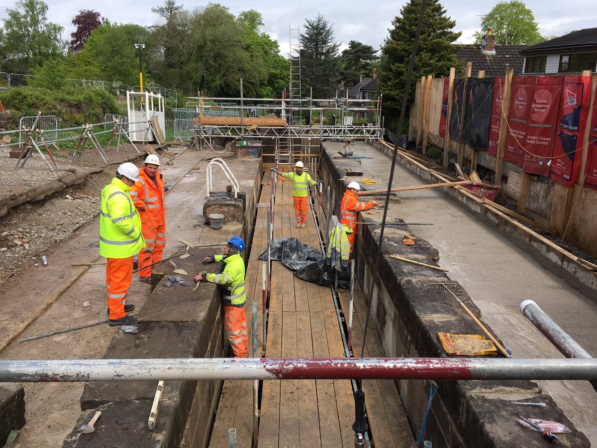 JohnPAckroyd's tweet photo. Marple Lock 11: last of the coping stones being positioned today on site to complete the main lock rebuild. Photos above and below the scaffold platform . @CanalRiverTrust https://t.co/kUiEA8CBQn