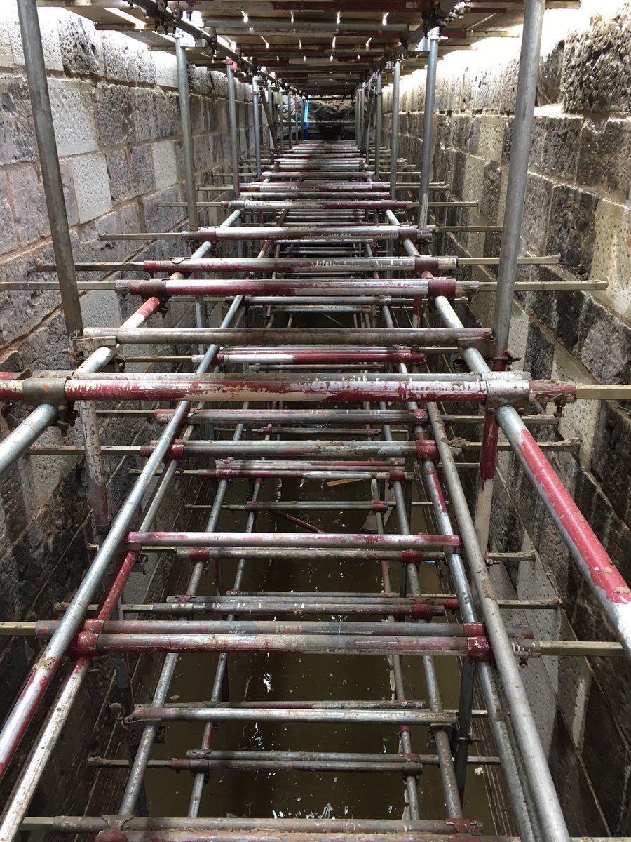 Marple Lock 11: last of the coping stones being positioned today on site to complete the main lock rebuild. Photos above and below the scaffold platform . <a href="/CanalRiverTrust/">Canal & River Trust</a>