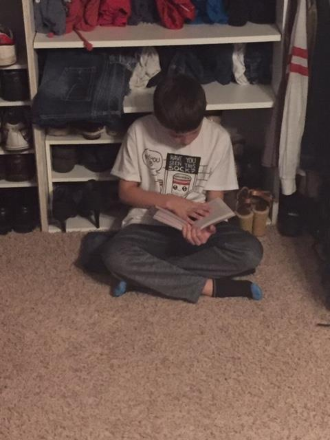 3rd_be's tweet photo. Reading in his closet!  #WEareBV https://t.co/OVGIPAAANT