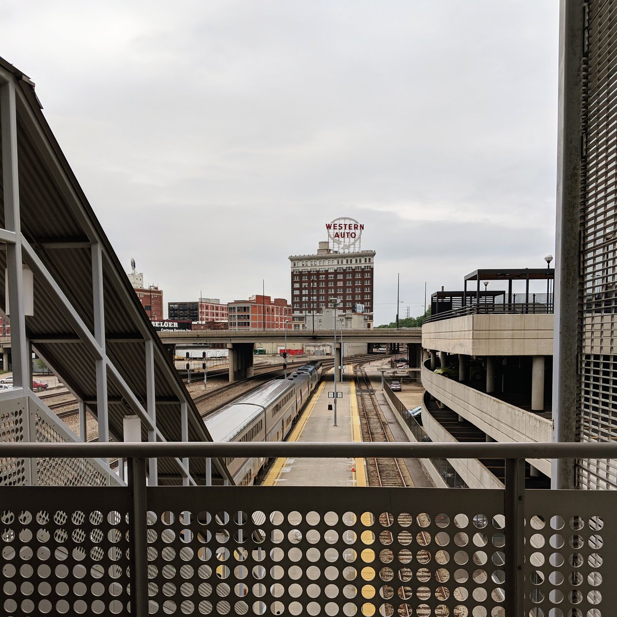 Great view of our building as passengers board the Chicago bound <a href="/amtrak/">Amtrak</a> from <a href="/UnionStationKC/">Union Station KC</a>. #amtrak #amtraksouthwestchief #downtownkc #kcmo #kccrossroads #westernauto #westernautobuilding