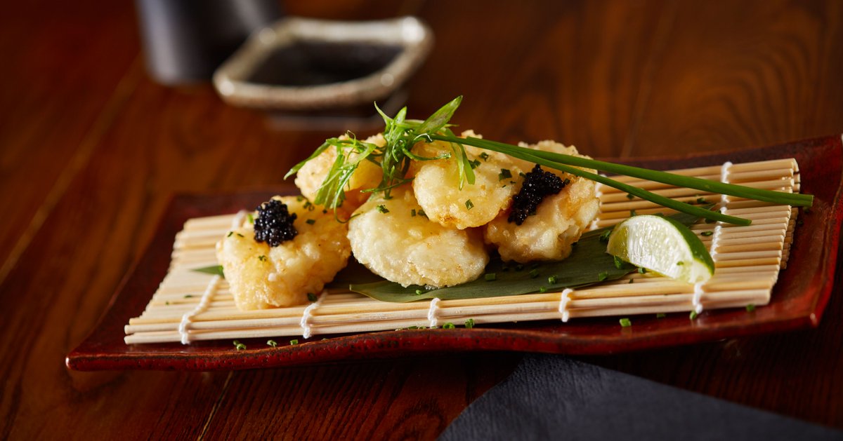 Start off a meal with these poppable fried cod cheeks tempura with caviar.