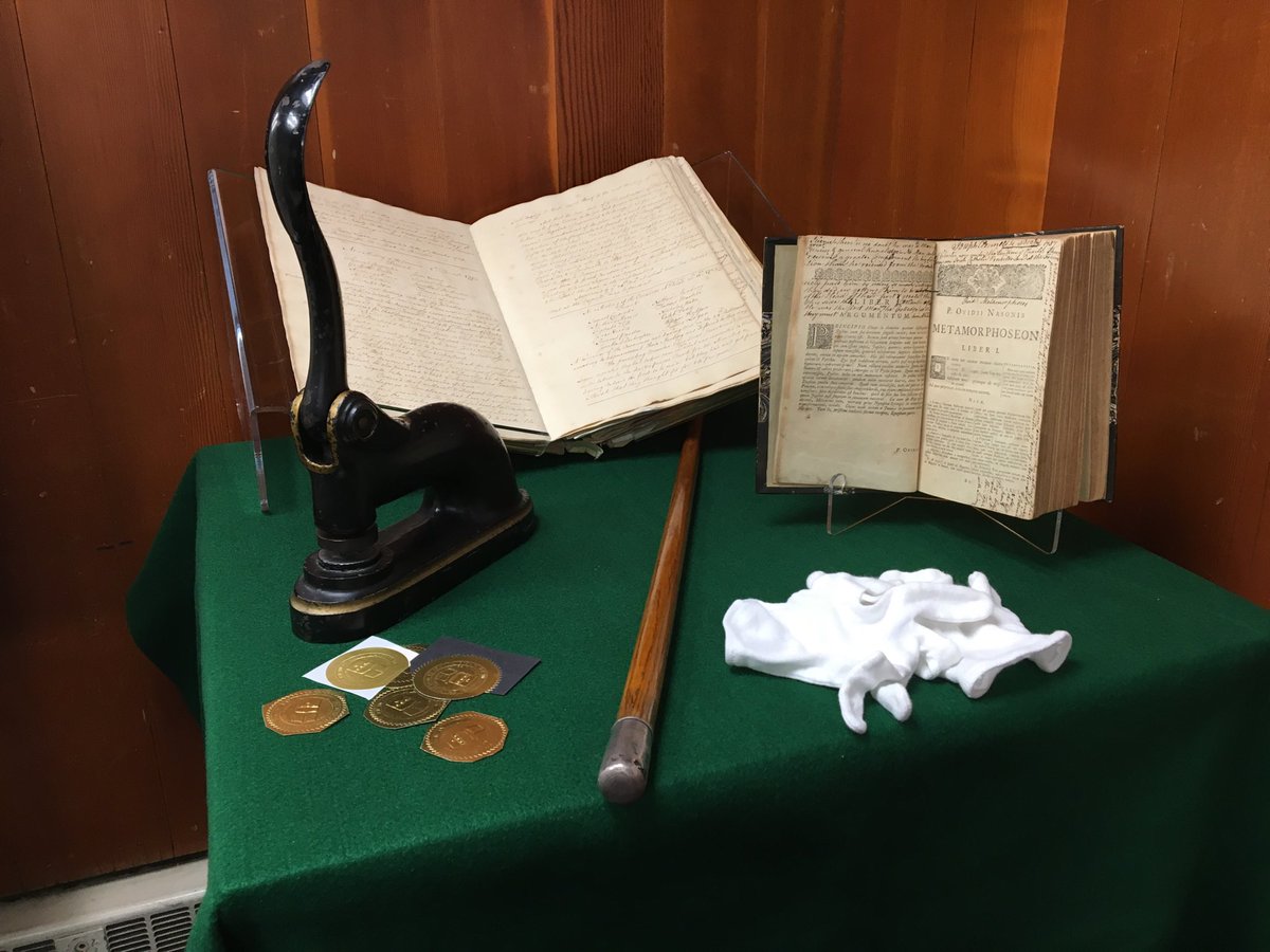 PennCharter's tweet photo. OPCs tour Mr. Granger’s pop-up museum of PC treasures: charters, seal press, athletics gear, and more PC #HistoryRevealed #OPCWeekend https://t.co/4s0CSWAxBW