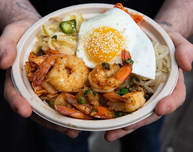 It takes two hands to handle the weekend garlic shrimp special @kimjongsmokehouse.pdx Available all weekend starting today! 📷: @alanweinerphotos bit.ly/2vB7uzF