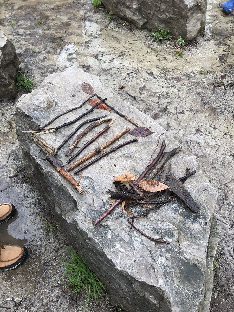 What a great way to learn...out in nature.  Making art and forts with branches, sticks and twigs. 2C is resourceful!
