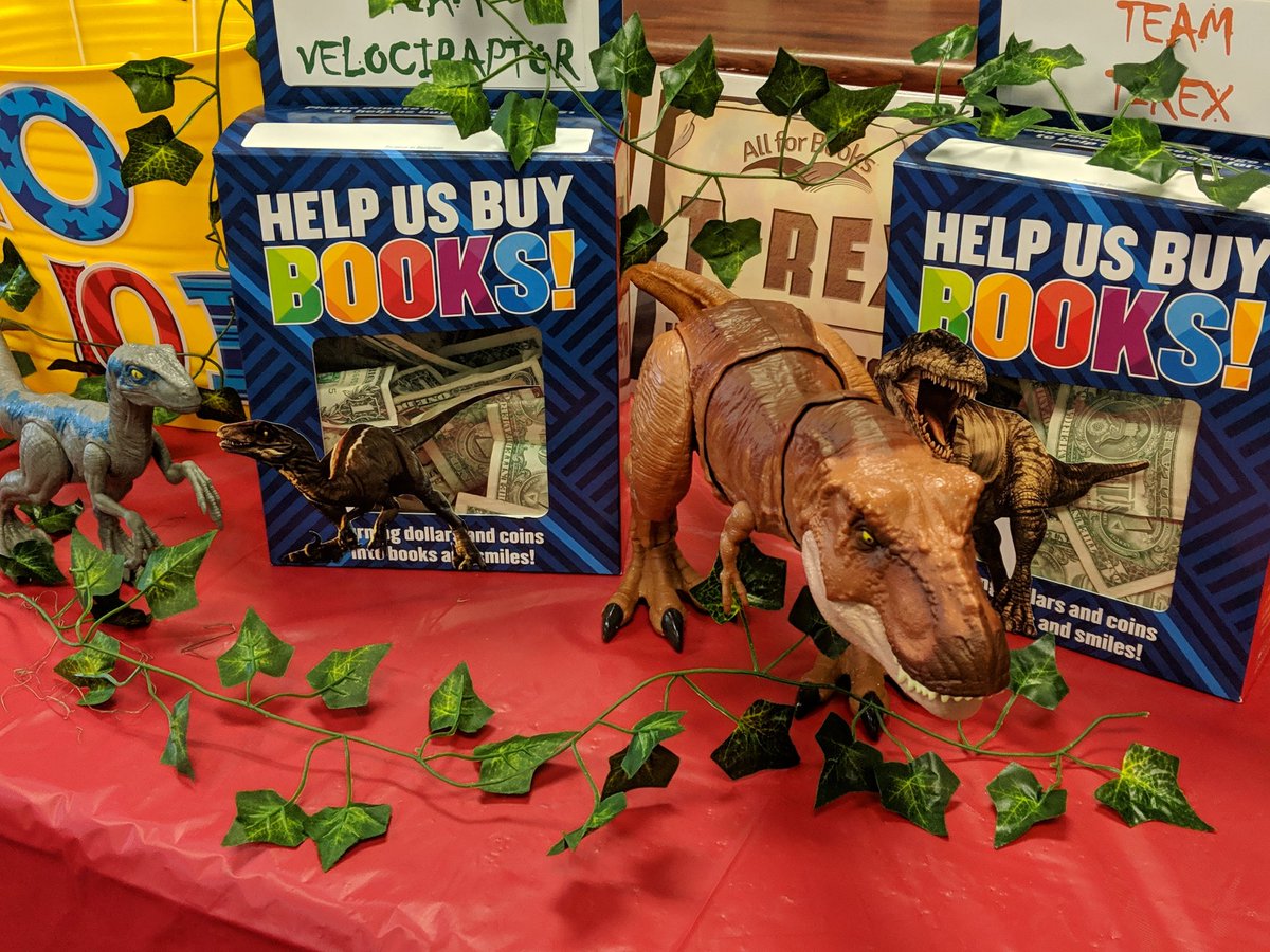 Our Team T-Rex vs. Team Velociraptor competition has been FIERCE! Winning by a tight margin of $2.38 is... TEAM VELOCIRAPTOR!!! @Discovery_elem raised $126.32 for #AllForBooks, which allows students to afford book fair books! Amazing!! 🤩