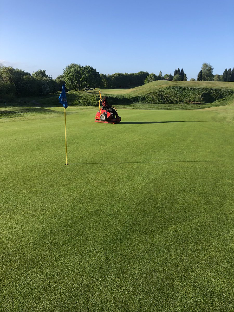 Nice morning for it. Greens cut and ironed, holes changed bunkers raked.