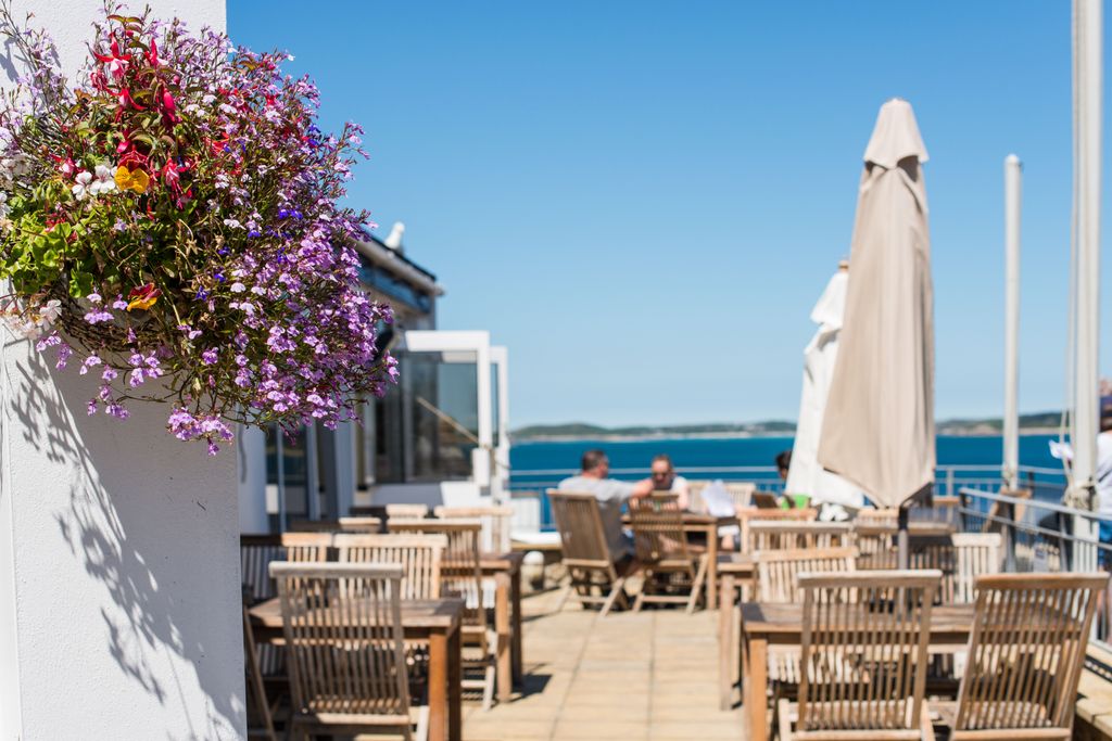 Tregarthens's tweet photo. Lots happening at Tregarthen's over Gig weekend. It's one of the busiest times of the year in the Isles, so come on over to Tregarthen's Hotel to refuel, relax and enjoy the excitement! #hotel #restaurant #creamtea #afternoontea #cornishbreakfast #seaview #gigweekend #cocktails https://t.co/yldFL62t8X