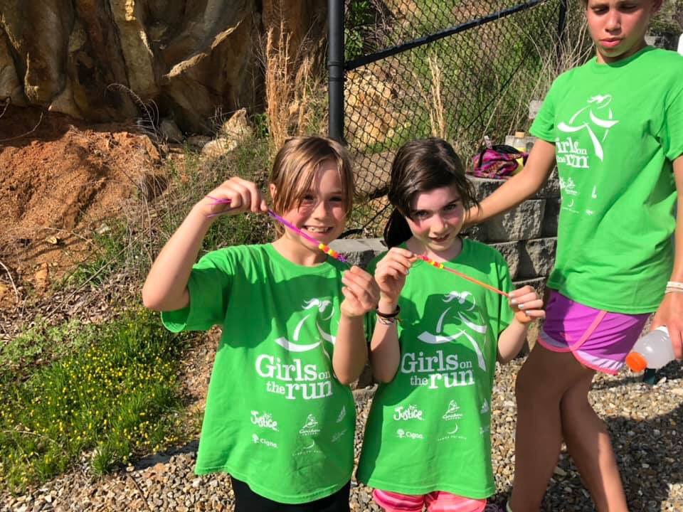 gotrwnc's tweet image. Practice 5k = DONE for our @UncAvl #GirlsontheRuncommunity team! 👏🏻👏🏻They got a bead for every lap completed that created celebratory keychains. It was also a hot day, so coaches spritzed them with water along the way. YOU GO GIRLS! 📸: Coach Rachel #gotrwnc