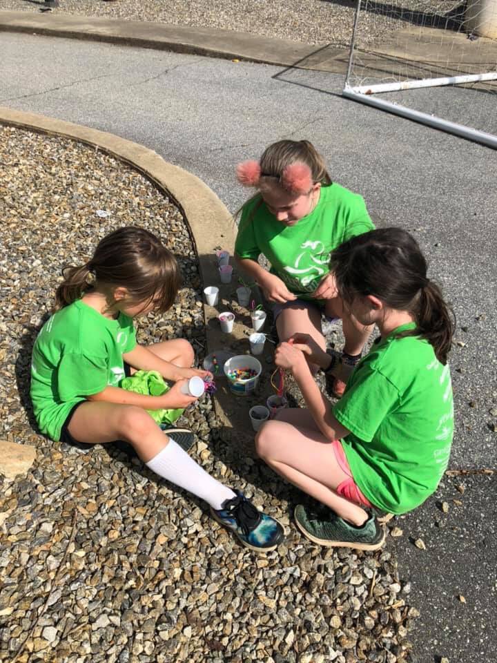 gotrwnc's tweet image. Practice 5k = DONE for our @UncAvl #GirlsontheRuncommunity team! 👏🏻👏🏻They got a bead for every lap completed that created celebratory keychains. It was also a hot day, so coaches spritzed them with water along the way. YOU GO GIRLS! 📸: Coach Rachel #gotrwnc