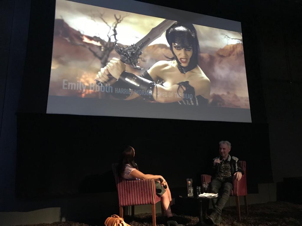 Me and jake west watching clip from my latest film ⁦@ShedoftheDead⁩ out May 20th during my stage interview today about my career at the fantastic ⁦<a href="/ParacinemaDerby/">Paracinema</a>⁩ was a total honour xxxx