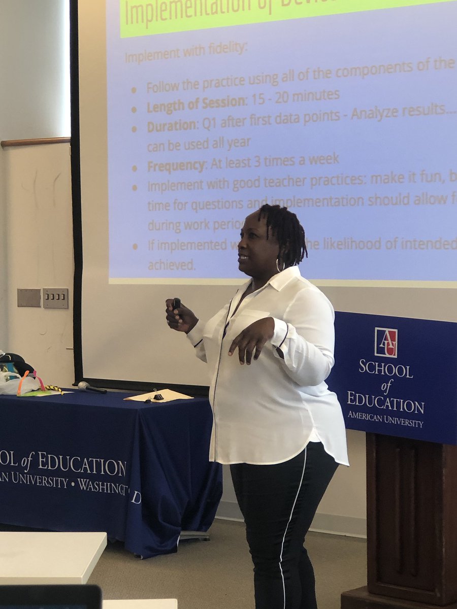 Angela_Educates's tweet photo. “I’ll do anything to help my students learn.” -Clara Epps presenting on routines and mneumonic devices (notice the silly glasses and mock microphone on the table) https://t.co/mvH8WMpLV8