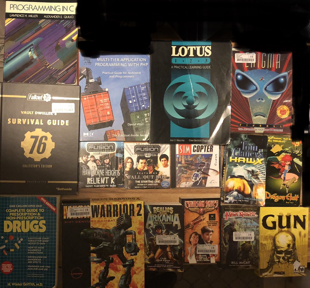 LongwoodGeek's tweet photo. So here are the photos of what @PuckBrandGaming &amp; I picked up on our trip to and from TN. The “Crimson Skies” book will be going to @DrunkenMstrPaul &amp; Puck found the unpatched “SimCopter” version thanks to @lazygamereviews vid on it: https://t.co/DrT8tL5Vy6 #pickups #puckups https://t.co/8CYURyjBnZ