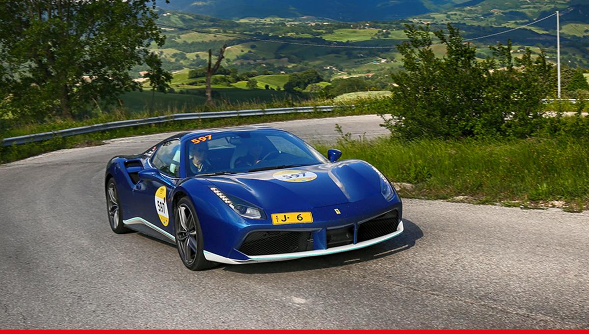 Ferrari's tweet photo. The Ferrari Tribute to #1000Miglia continues to make its way through stunning Italy, where the roar of our models pairs with gorgeous landscapes. #Ferrari https://t.co/uuZDl0CuMu