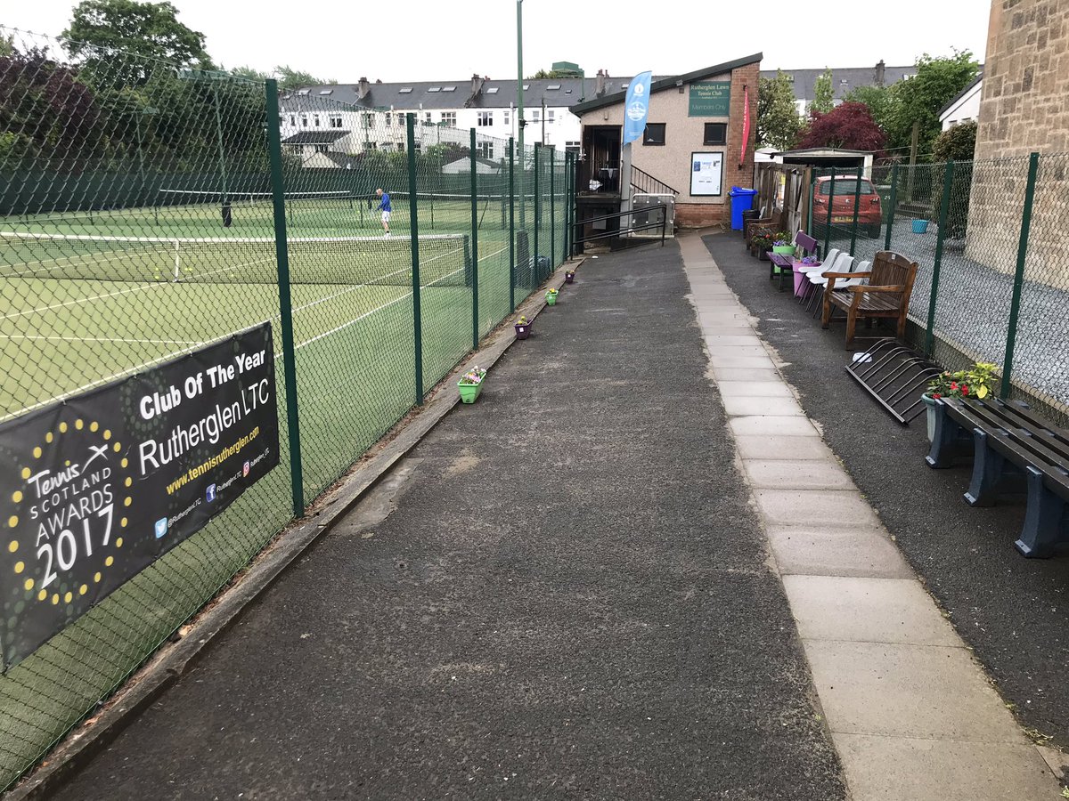 RutherglenLTC's tweet photo. Brilliant job from @Whitelawmcc & @douglasmccabe4 getting the grounds ready for #RLTCOpenDay! Planters looking amazing and benches given a lick of paint! #Volunteers #MoreThanAClub https://t.co/x8iY7LQwFO
