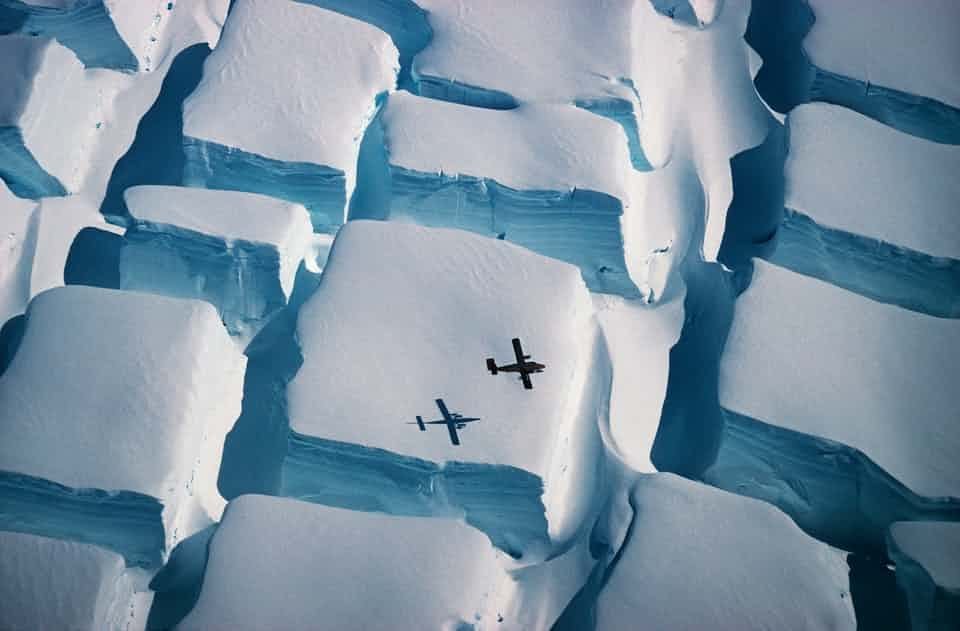 Rainmaker1973's tweet photo. This stunning aerial photo shows the scale of unusual bi-directional crevassing in Antarctica, as an ice sheet is stretched in two directions over an underlying rise https://t.co/c4aSNo7uE2 https://t.co/DPK5097TBa
