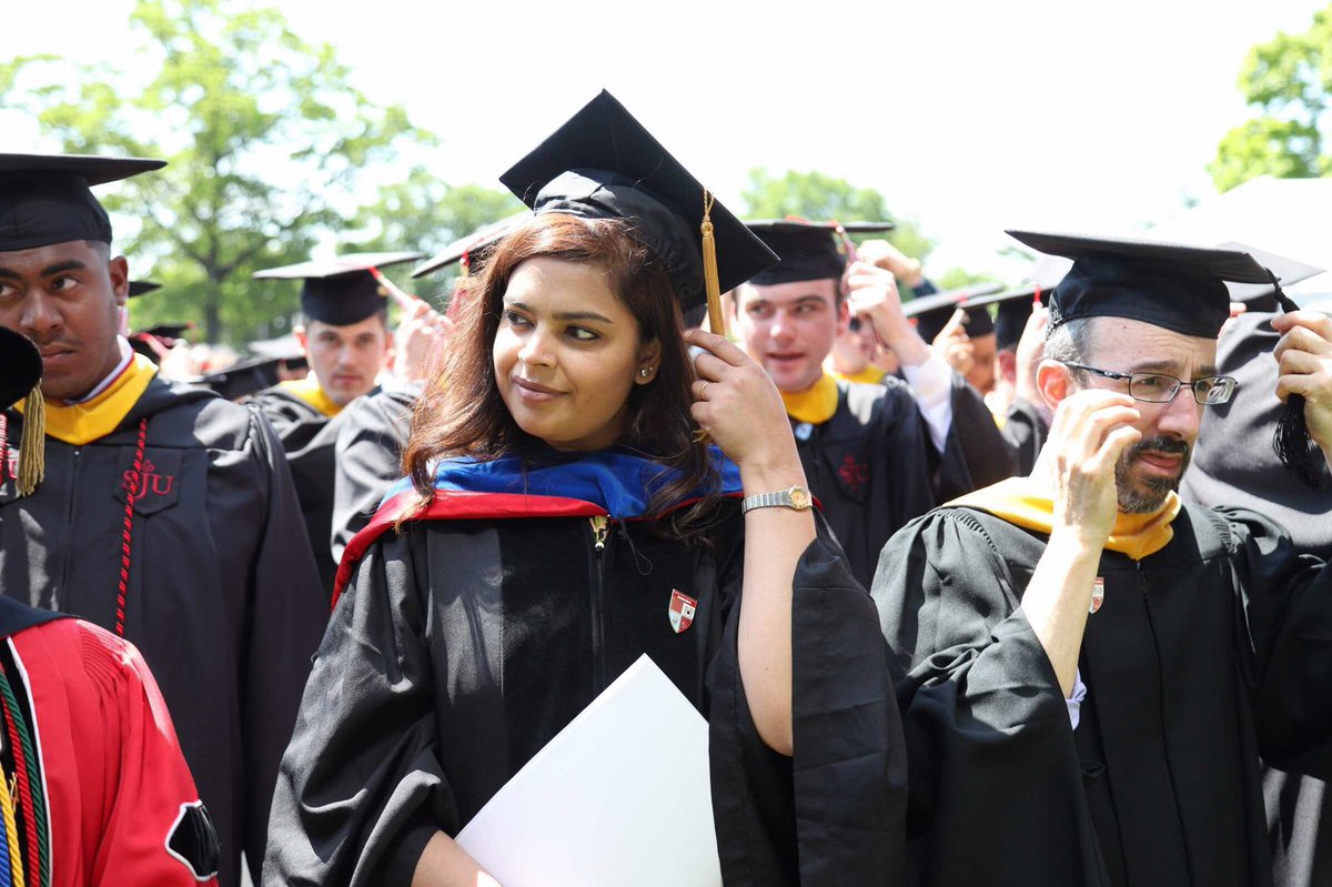 sjuhawknews's tweet photo. Provost and Vice President of Academic Affairs Jeanne Brady instructs the class of 2019 to move their tassels to conclude the ceremony #HawkHillGrad19 https://t.co/m3zFDKVDJt