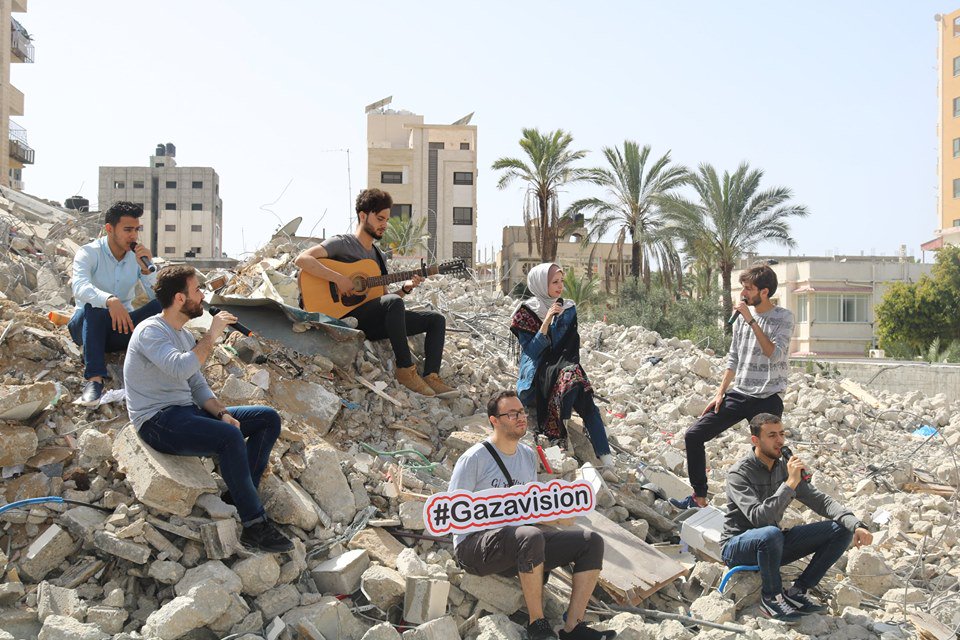 WeAreNotNumbers's tweet image. Congratulations to Jehad Shehada , who won our #GazaVision song contest today, and thanks for all the singers who sang for Palestine during the winner announcement's event which took place on the rubble of a building that was destroyed by the Israeli warplanes weeks ago in #Gaza.