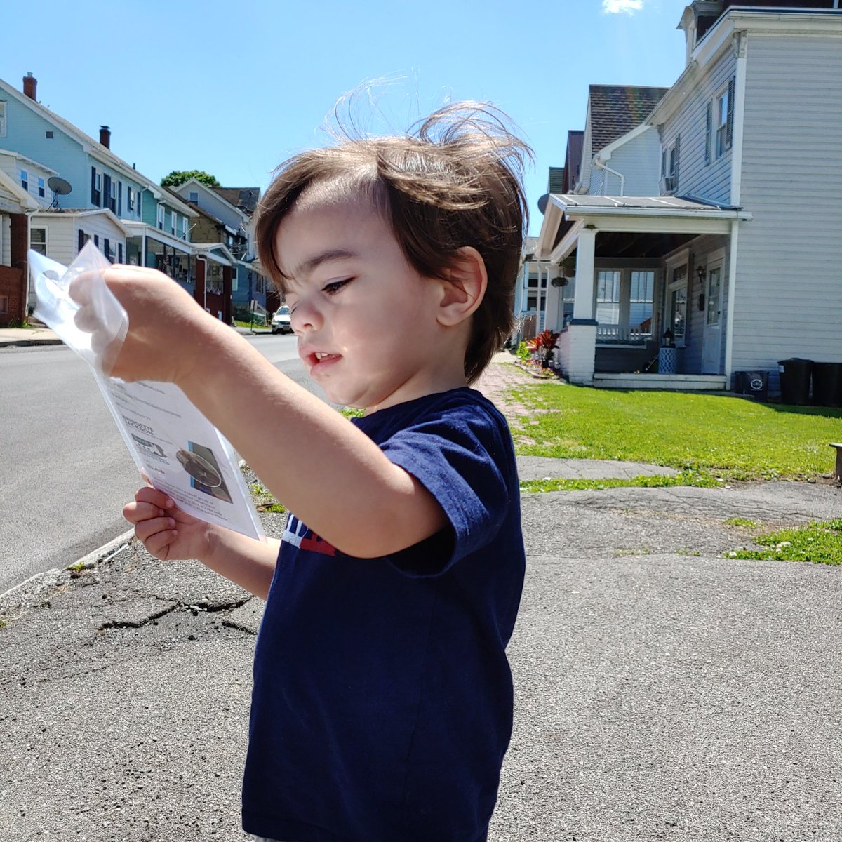 Roman takes a break to review his canvassing materials before moving on to the next door #votelocal #knockthevote