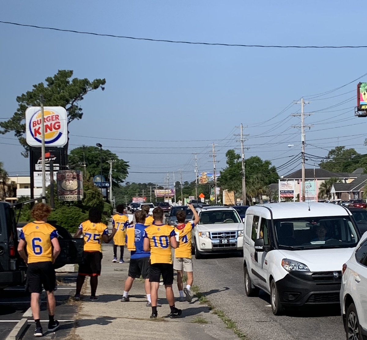 mreel25's tweet photo. NMB Football Parking Fundraiser @ The Blue Crab Festival! #weworkforours https://t.co/fi5taG7cfE