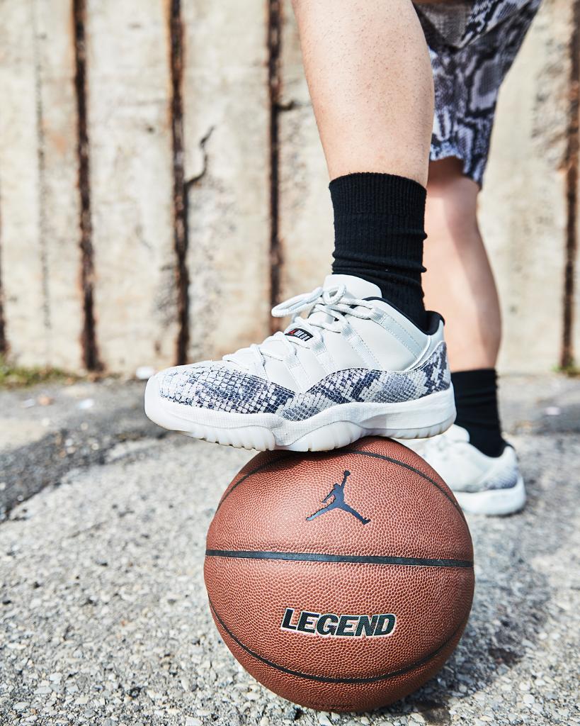 jordan 11 low snakeskin light bone on feet