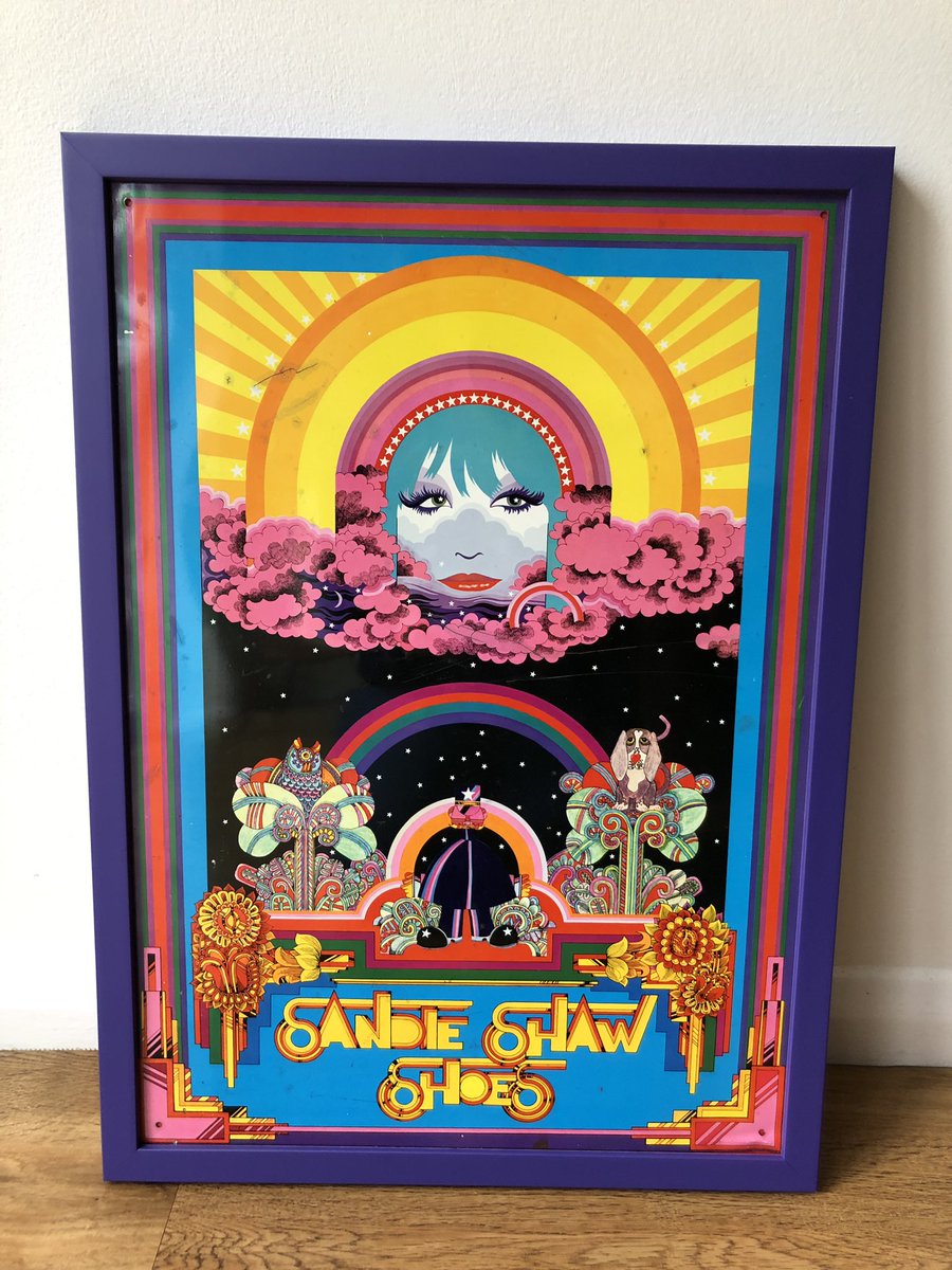 SuzeAppleMac's tweet photo. New art addition from the 60’s, back from the framers in time for Eurovision! #sandieshaw #sandieshawshoes #sixties #advertising #tinadvertisingsigns #eurovision #sixtiesdesign https://t.co/mwVARSR025