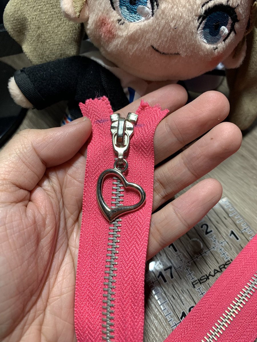 i wanted my panther suit to be a little different so i'm using hot pink zipper tape and heart shaped zipper pulls! also it was a pain in the ass making just ONE zipper lmao :,)