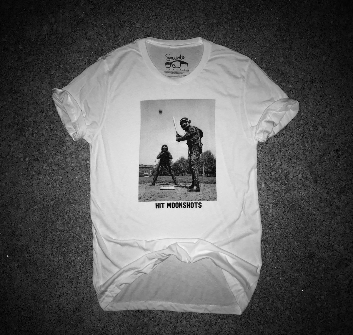 SquintsApparel's tweet photo. 🗣SALE ALERT: 

The Hit Moonshots tee is only $20 for the rest of the weekend in honor of tonight’s full moon... Tell that hanging curve and that waxing gibbous goodbye 👨‍🚀 

https://t.co/lTZwW0fge0 https://t.co/Hle7Z6C4Q2