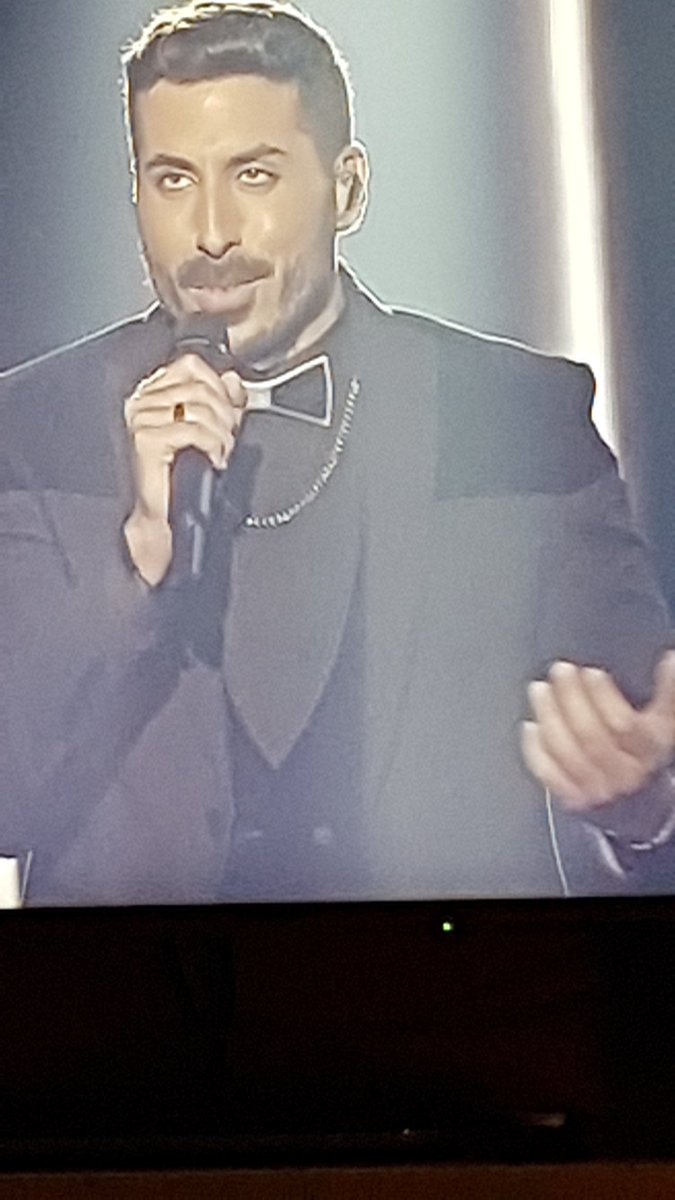 Sedan_Chair11's tweet photo. He's wearing a bow tie from the future #eurovision https://t.co/CVMsd3GZpb