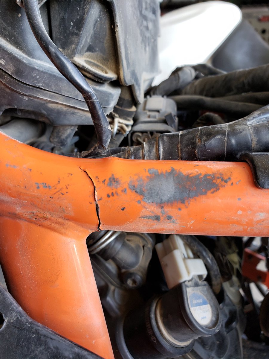 jraster's tweet photo. 2014 KTM 1190 Adventure R frame failure.  25900 miles adult ridden, no jumps.  I saw the 2016 version has an upgraded brace over the rear shock mount.  Im guessing the shock bolt bent taking the frame with it.  What do you think @KTMUSA ?   
#xladv #ktm #brokenfame #1190adv https://t.co/QVZ4ElPl3n