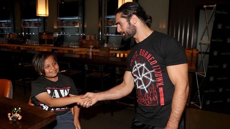 Brick_Sullivan's tweet photo. While taking a break from the meet and greet. I was able to meet this young man. He was so thrilled to be at the access before #Blackout I gave him front row tickets for him and his mom. @PHW_EFED https://t.co/aMHbsfeLd6