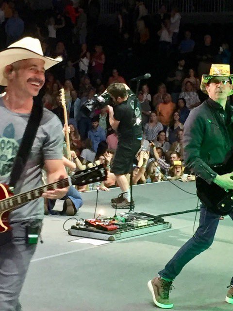 cosmiccrust's tweet photo. it’s my dad’s last night of the chesney tour &amp; a fan made him a hat out of @millerhighlife cardboard &amp; put it directly on his head during the gig????? https://t.co/Nd4ZViPVDD