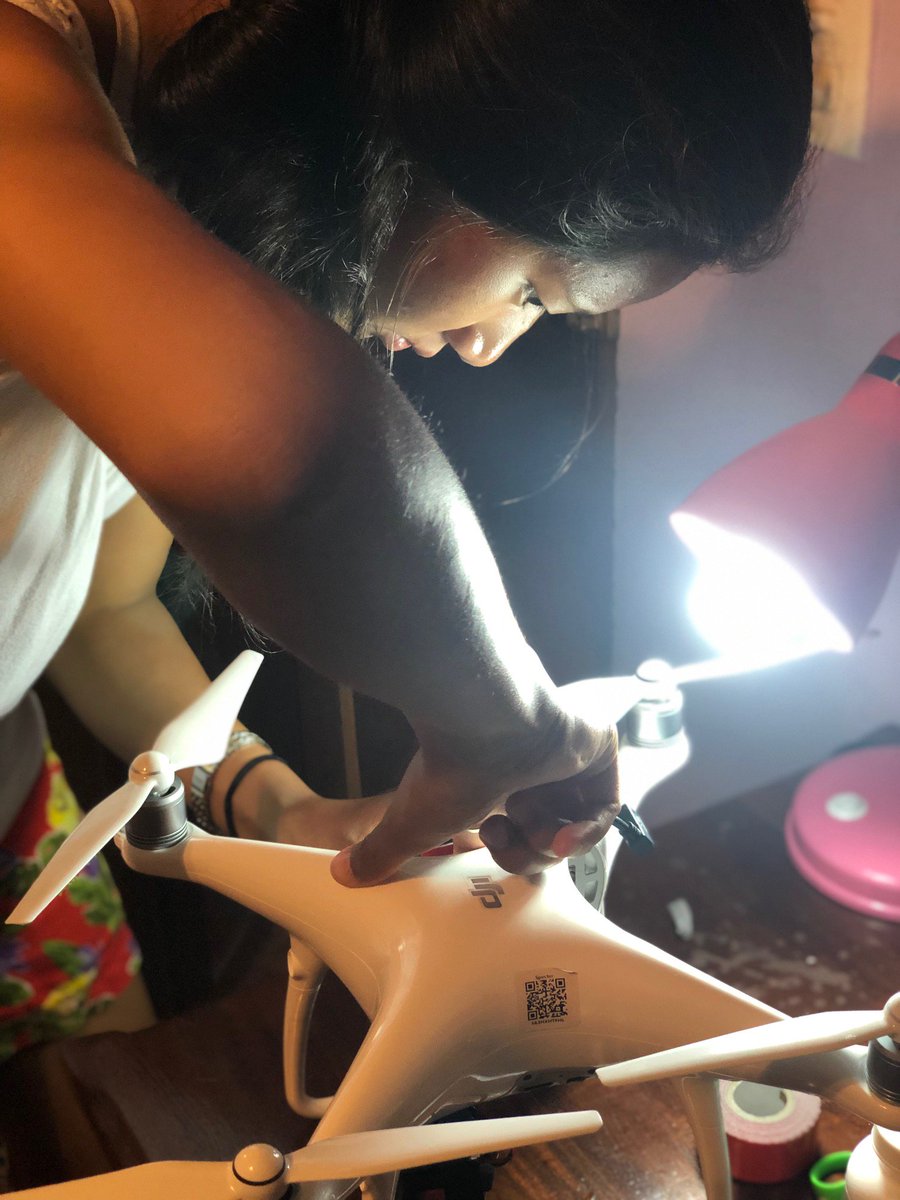 kellydobroski's tweet photo. Thankful for our engineer to give our drones some love! We're working these @DJIGlobal Phantoms hard - @DukeU undergrad Virginia Pan fixed up our multispec camera connection after some adhesive melted from the heat and over-use. #WomenInSTEM #DukeBassinBelize #drones4good https://t.co/gaWca8WssD