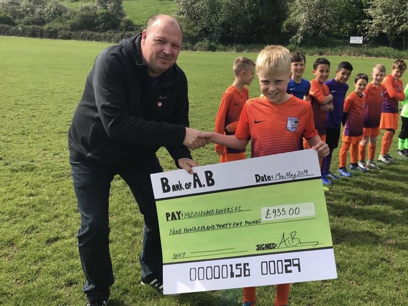 Middlewood_Rov's tweet photo. One of our U10’s presents the club with a cheque for £935 from his sponsored bike ride towards our fundraising project.
Thank you #legend 
@SDJSFL @billysharp10 @SHCFA https://t.co/4KG8HS2nbq