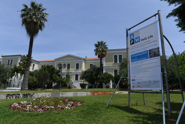 athens_world's tweet photo. Athens Photo World (June 7-16, 2019) arrived in the city! Our first banner is displayed outside the Cultural Center of the City of Athens at Acadimias Street. All the info at https://t.co/BBQ7uskrfp #APWGREECE #athensphoto https://t.co/jmN2icKLmH
