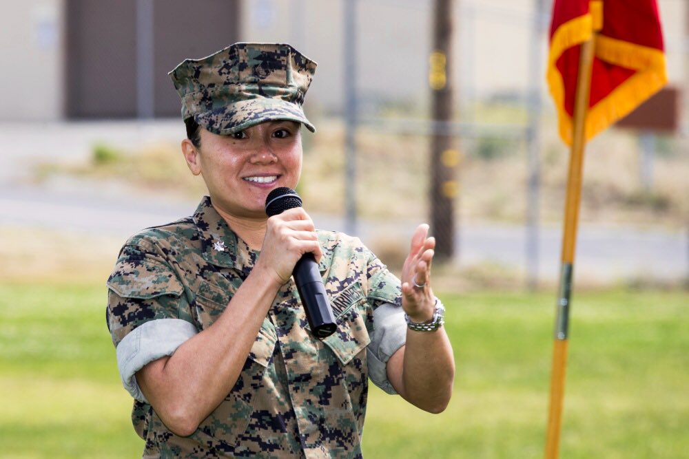 MCIWPendletonCA's tweet photo. Lt. Col. Maisie Wong, commanding officer, Unmanned Aerial Vehicle Squadron 4, MAG 41, 4th MAW, addresses the crowd during the change of command ceremony at Camp Talega, Camp Pendleton. Wong assumed command of VMU-4 after serving as the Ops officer for Marine Corps Forces South. https://t.co/wHvApMGOlD