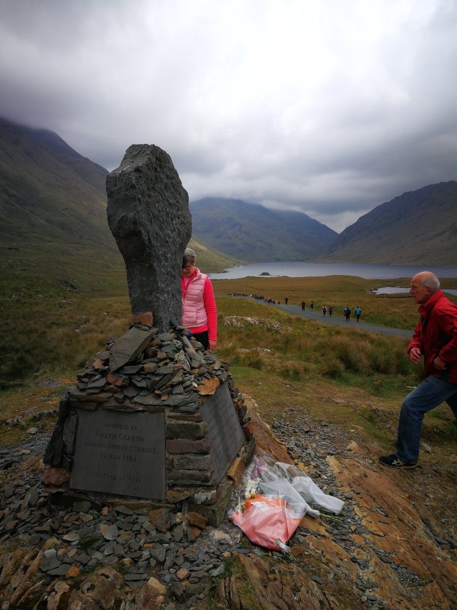 mickgeo3's tweet photo. The word legend is overused these days, but when you pened   anthems, such as The Fields of Athenry &amp; The Rare Old times, youve earned it. Pete St John (middle of the banner) led us out on the 2019 Afri Famine walk, commemorating all  who perished in Doolough during An Gorta Mor https://t.co/5cojzPHzEs