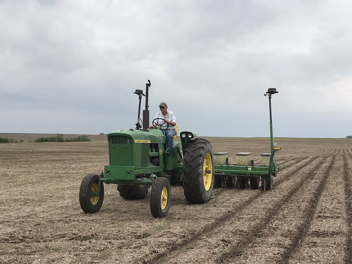 Dschuster77's tweet photo. Got a great pic of dad yesterday spot planting  some corn in.  He can always fix what I mess up.   #plant19 https://t.co/YCZcS0Epe6