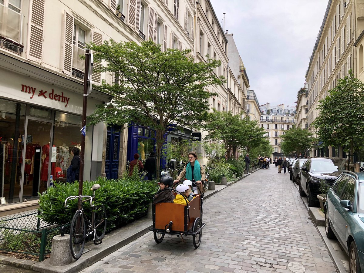 Cars aren’t banned from these Central  #Paris streets — but they’re tamed enough that every driver knows pedestrians are in charge. Like Dutch  #woonerfs, cars move at the pace of a strolling pedestrian. This isn’t hard — it just takes a rethink, & will.  #Paris  #streetsforpeople