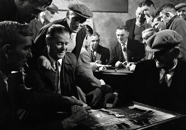 htimes100's tweet photo. Coal miners playing dominoes and cards at the miners’... https://t.co/ZhMuAacA4i https://t.co/PcuUqv4Prh