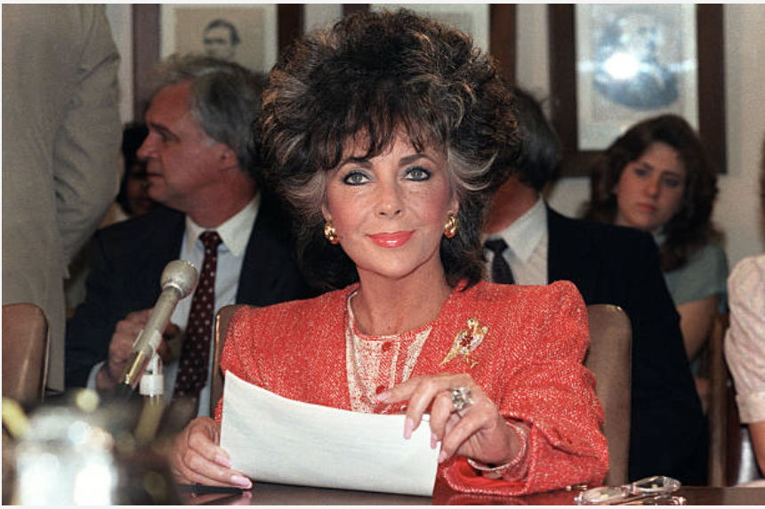 1. 33 years ago today, Elizabeth Taylor walked into a Senate hearing & spoke of "a national scandal, a scandal of neglect, indifference & abandonment" She did what no other major public figure was willing to do: she demanded that elected officials pay attention to the AIDS crisis