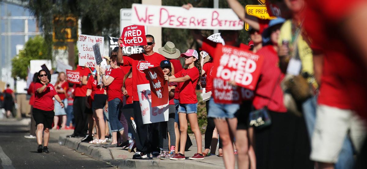 TucsonStar's tweet photo. Teachers, parents at 23 Tucson schools will walk in, stand out in support of #RedForEd https://t.co/hIqXgN8CA2 https://t.co/gSvjOneGqL