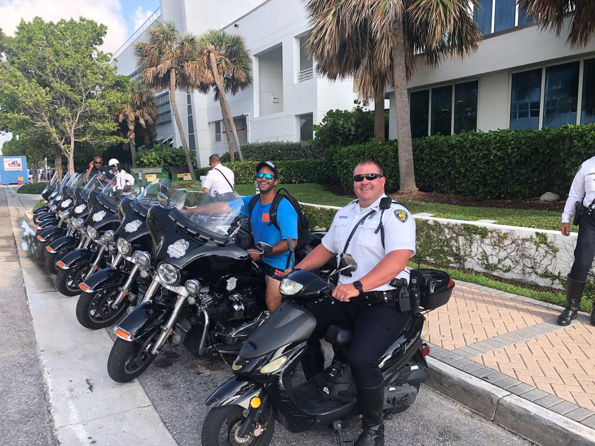 A Motor Line Up featuring one of our neighbors on a moped