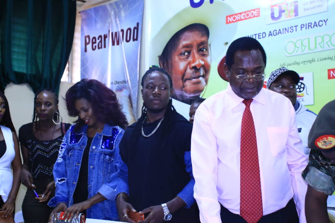 pearlwoodug's tweet photo. Catch the moments with the President of #Film_Producers Mr. @KayanjaTony next to @drumstress, the famous @Twejaka chairman of @info_uprs and along the general; Maj. Gen. Elly Kayanja as we celebrate the launch #United_Against_Piracy campaign supported by @norcode https://t.co/YGLy5uXVpu