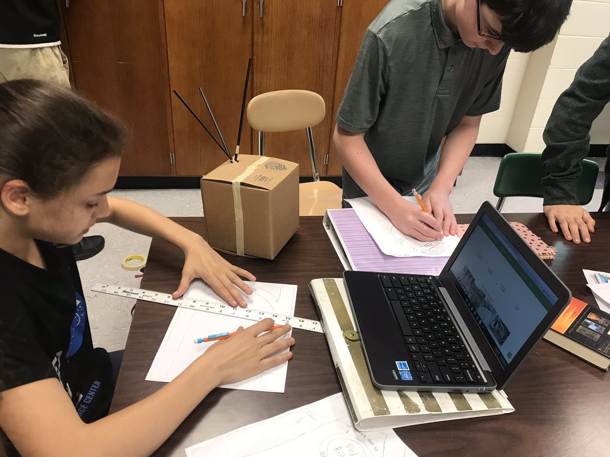 BrandiShort13's tweet photo. Students collaborating on their rain barrel engineering design and their garden design plan in @BWSDHarrisonMS PBL https://t.co/ed1L8VnZwR